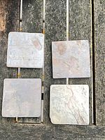 Close view of individual slate tiles showing color variation and surface texture