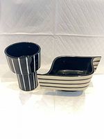 Front view of both striped ceramic vases