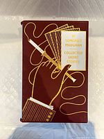 Slipcase front with gold illustration