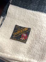 Close-up of original Eaton's Trapper Point label on blanket