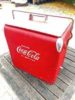 Front view showing Coca-Cola logo and overall condition