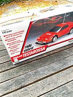 Retail box showing Nikko Ferrari Testarossa branding and 1/10 scale information