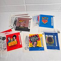 Grouped view of all 5 wrapper designs showing quantity piles