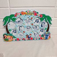 Front view of wooden photo frame showing design and photo openings