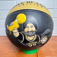 Front view showing caricature of Nav Bhatia, trophy image and Hall of Fame Edition text