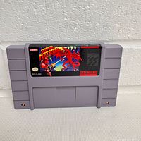 Front view showing Super Metroid label and cartridge condition