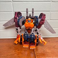 Front view of Optimal Optimus showing wings, arms, legs, chest paint