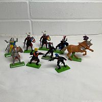 Group shot of all eight knights and horse