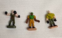 Group view of all three miniature figures