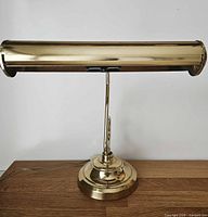Front view of brass desk lamp with shade level