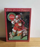 Front of sealed puzzle box showing Santa Claus artwork
