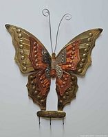 Front view of mixed metal butterfly key holder showing full shape and hooks