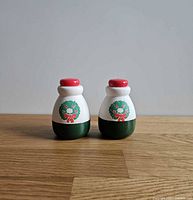 Both diffuser pots front view showing design and size relationship