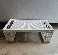 Overall view of white wicker breakfast tray front