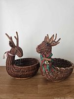 Both wicker reindeer baskets side by side showing overall form and accents