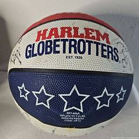 Full view of Harlem Globetrotters basketball showing logo and star graphics