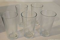 Five Crate & Barrel Rings pattern cooler glasses displayed upright