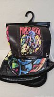 Folded fleece throw with hang tag showing Mindflayer artwork