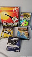 Group shot of five PC flight simulator game packages