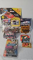 Group shot of all five packaged NASCAR diecast cars