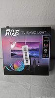 Front of retail box showing RGB TV Sync Light product image
