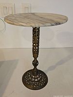 Full view of brass stand with marble top