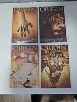 Front view of all four bagged Origin issues (#2–5)