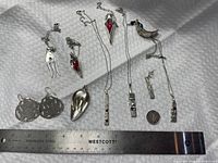 Overall layout of all jewellery items with ruler for scale