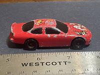 Left side view showing car length and paint wear