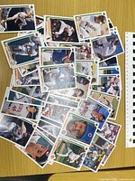 Pile of assorted Upper Deck baseball cards spread on table