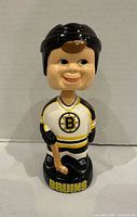 Front view of Boston Bruins bobblehead showing uniform, base, and overall condition