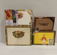 Three closed boxes: two Romeo y Julieta, one Montecristo