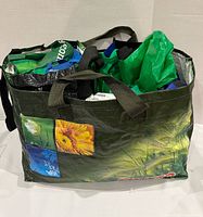 Front view of reusable grocery bags assortment inside large nature-print tote