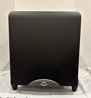 Front view of Klipsch Sub-10 subwoofer showing cabinet and badge