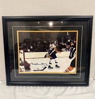 Front view of framed autographed Bobby Orr photo