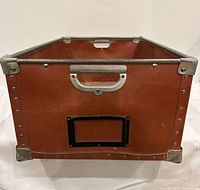 Front view showing metal label holder, corner guards and rivets