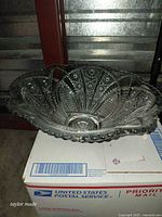 pressed glass bowl with beaded scalloped rim and geometric pattern