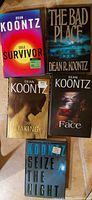 Group of five Dean Koontz hardcover novels showing titles and dust jackets