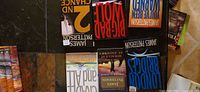 Group of James Patterson books laid out showing covers including 2nd Chance and The Big Bad Wolf