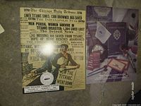 Replica Chicago Tribune front page and purple-cover Titanic Commutator issue