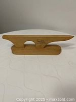 Full view of Dritz No. 695 point presser on clapper base