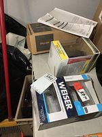 All three boxed items on table