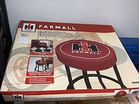 closed retail box showing full image of Farmall stool