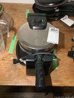 Closed Bella waffle maker showing exterior and handle