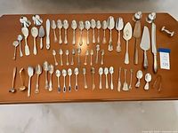 overview of entire flatware lot on table