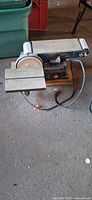 Full view of Craftsman belt/disc sander on wooden base