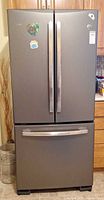 Full front view of GE French door refrigerator