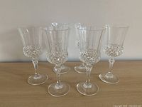 Six Cristal D'Arques crystal water goblets grouped on table