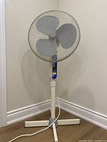 Front view of pedestal fan showing overall design