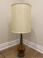 Full view of lamp with shade attached showing overall design and height